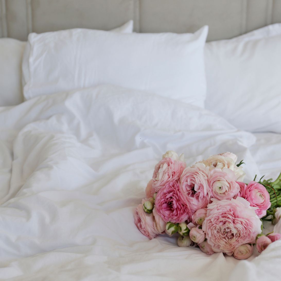 Emma Signature Boxspring met bloemen op dekbed